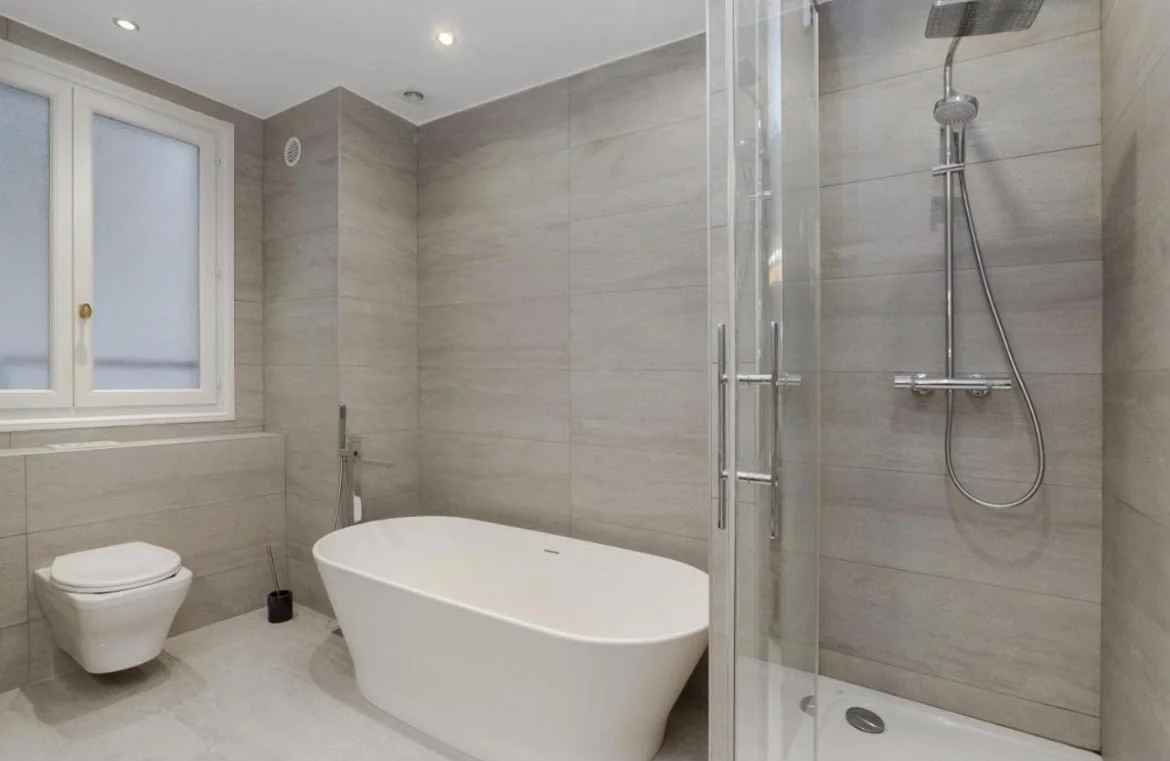 Bathroom with freestanding bathtub