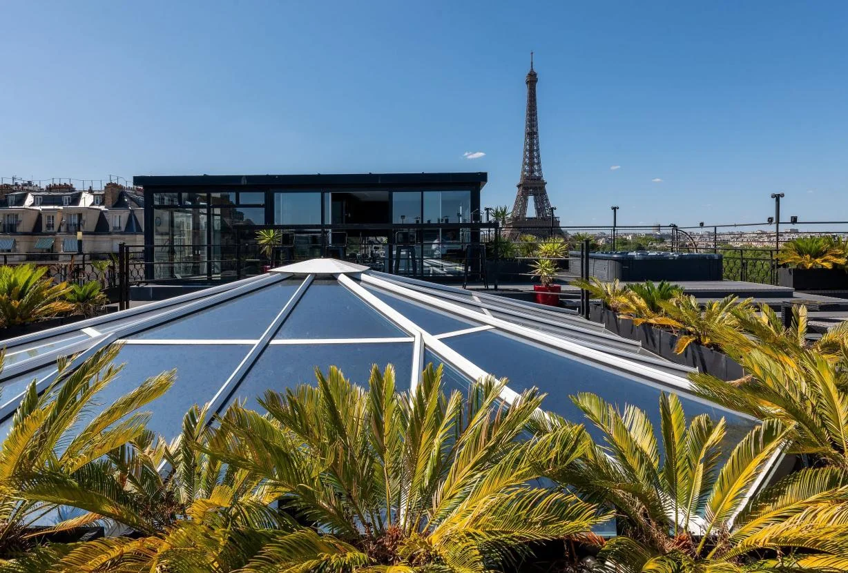 Rooftop pool, palm trees and Eiffel Tower