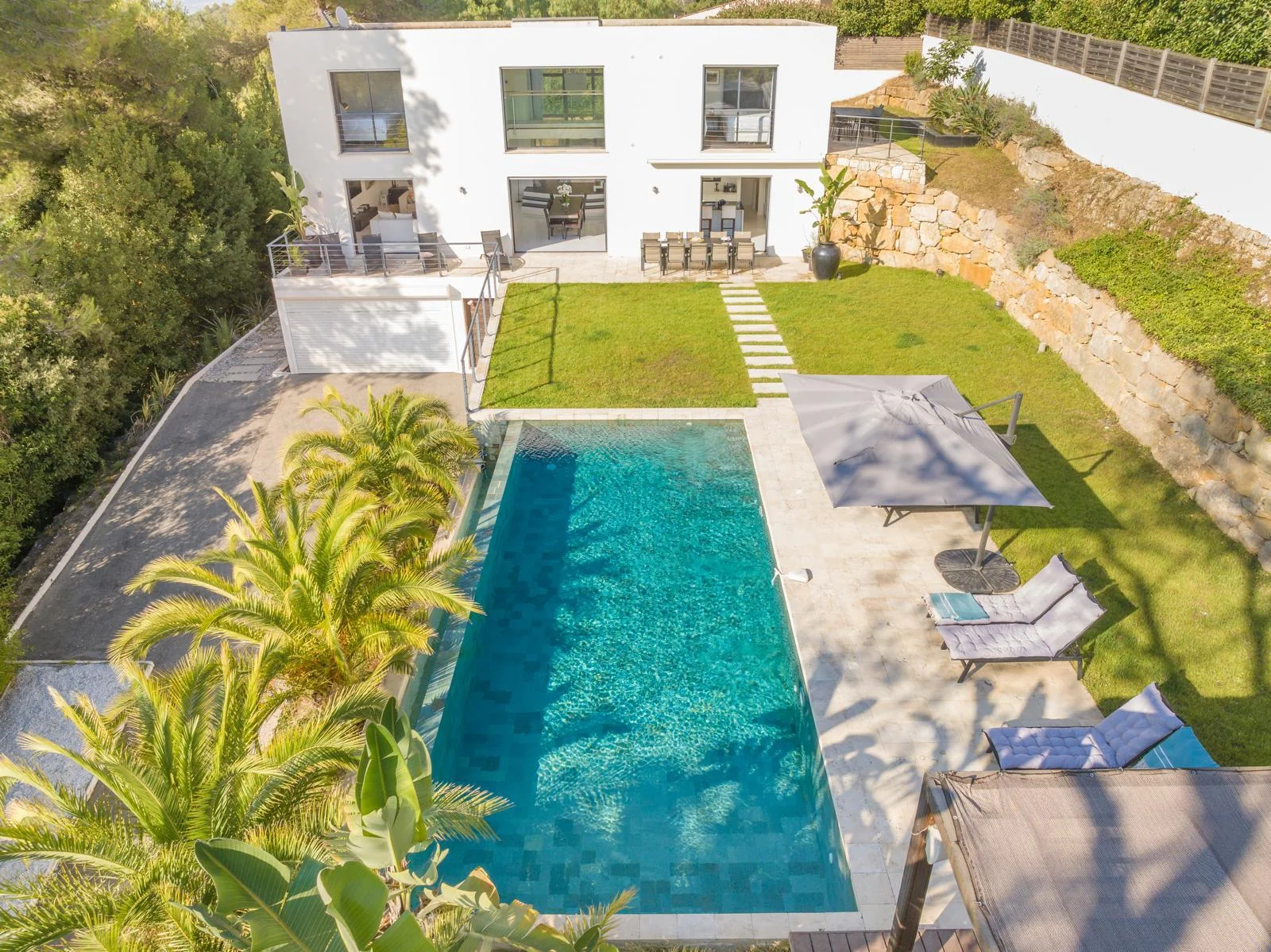 Facade, pool and garden